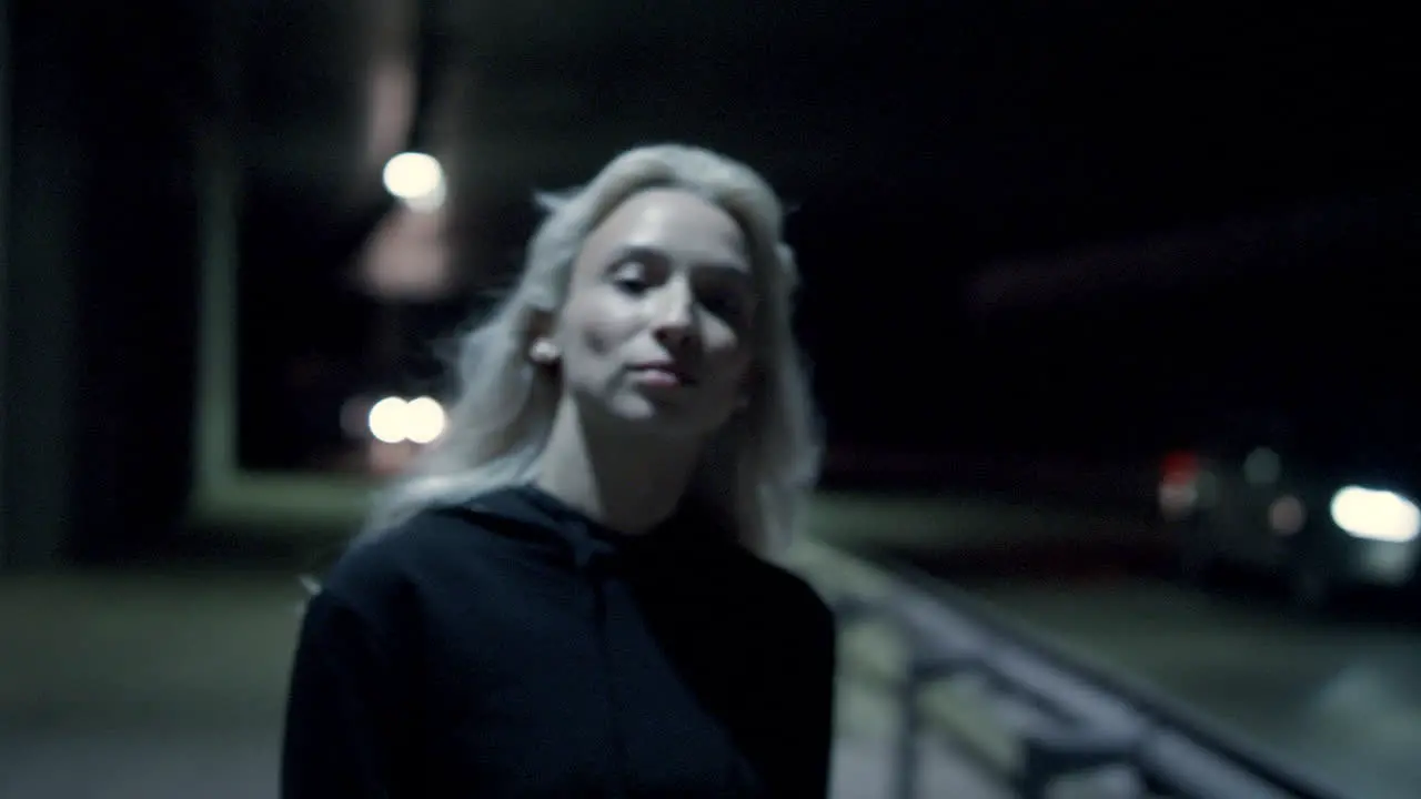 Confident walk woman night highway in urban background at city lights