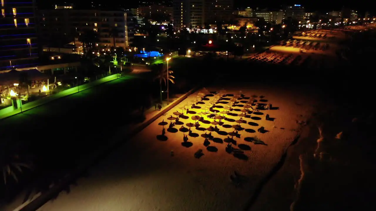 Late night life parties at island Mallorca Spain aerial at beach