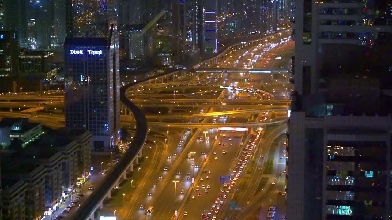 Panoramic City View Of Dubai At Night In Sheikh Zayed Road wide shot