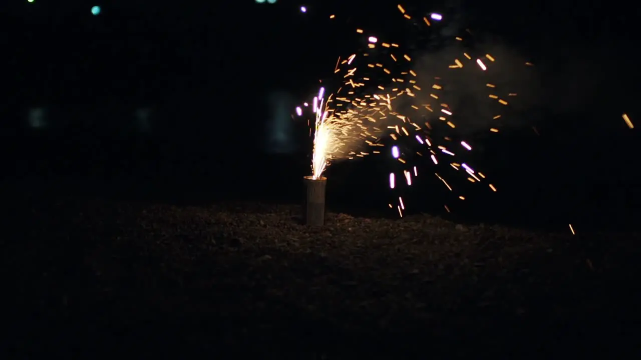 A Small Hanabi Firework Sparkling And Bursting On The Ground In Kyoto Japan In The Evening close up