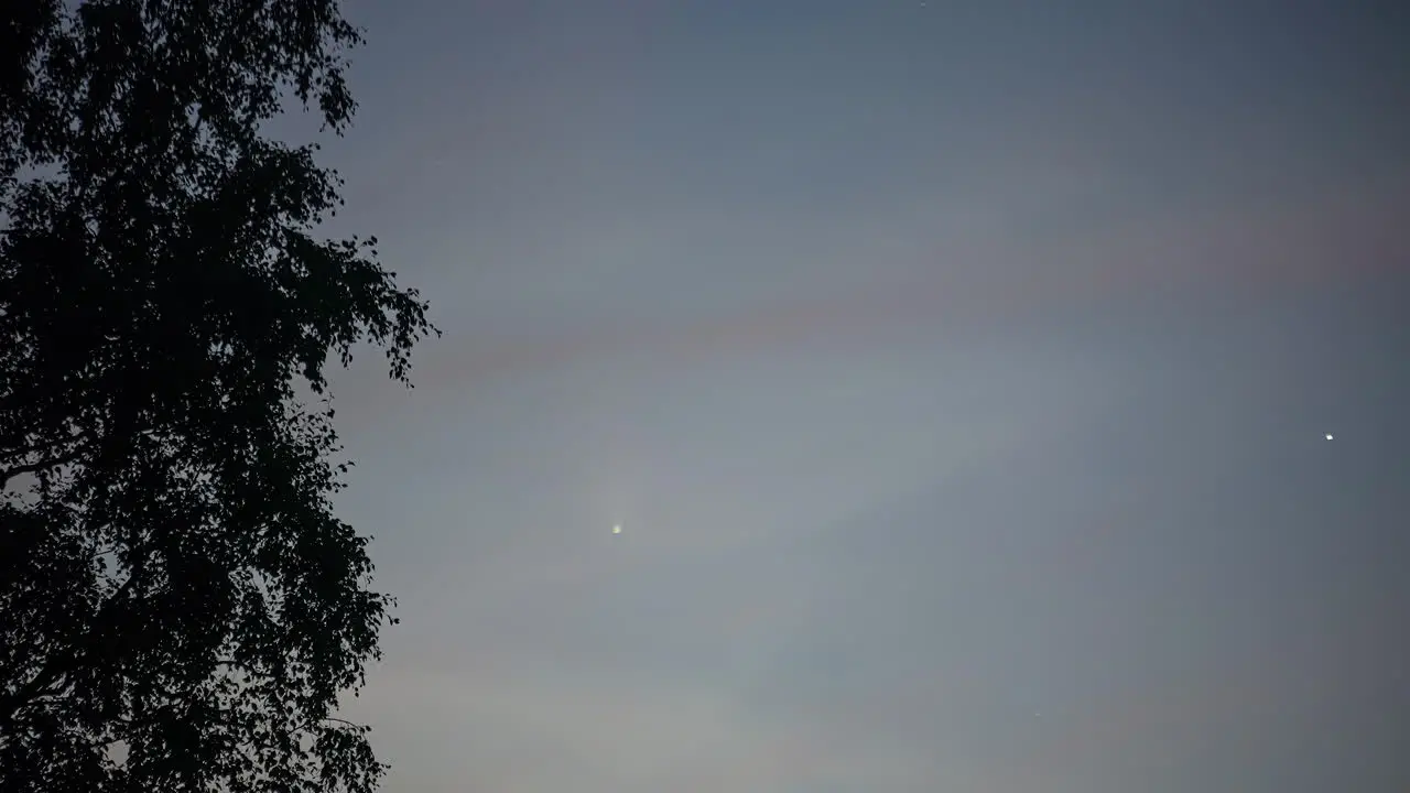 Comet with trail fly in night sky fusion time lapse