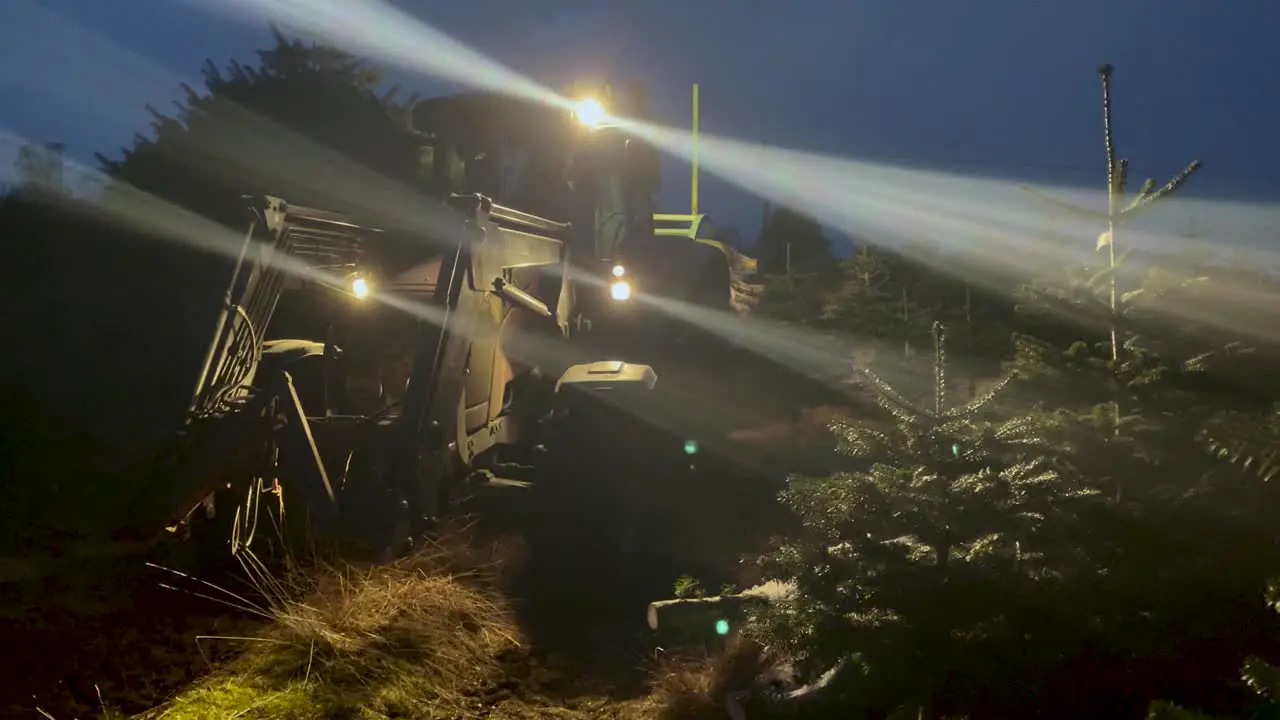 Big Agricultural Tractor Moving On The Trail At Night