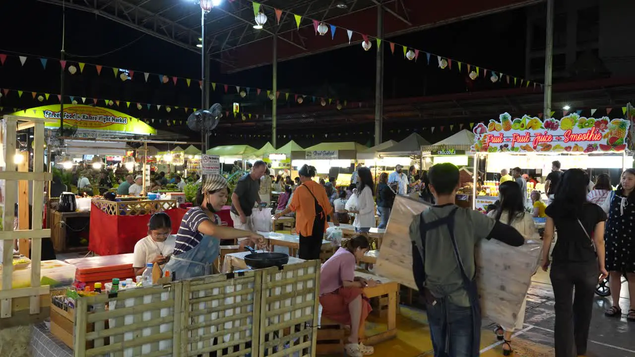 POV walking around a night market in Chiang Mai Thailand