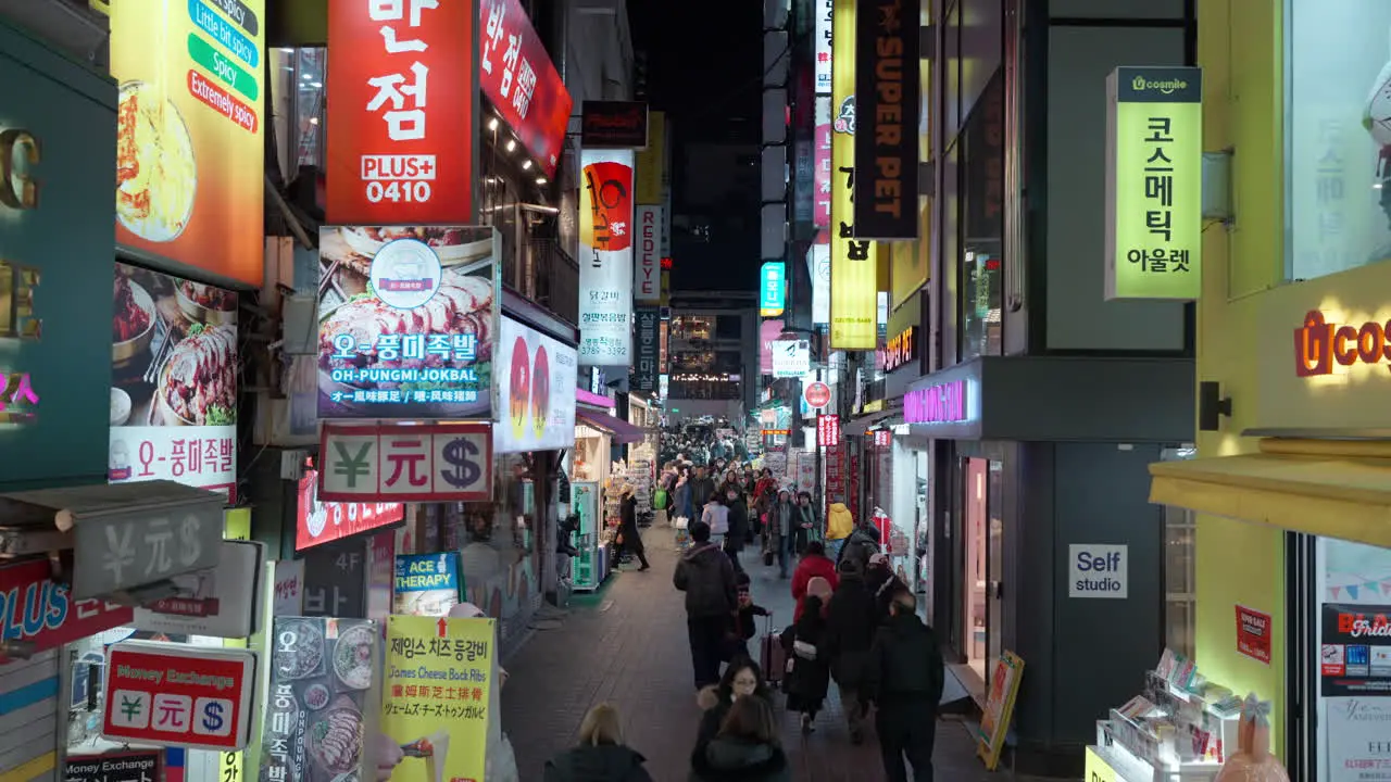 Myeongdong Night Market -Crowds of People Shopping at Korean Traditional District in Seoul Downtown high angle