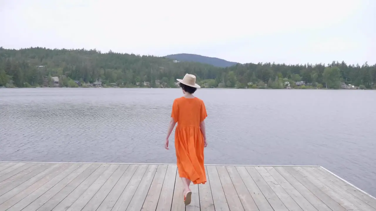 Pretty Caucasian Girl at Fashion Shoot Posing by the Lake