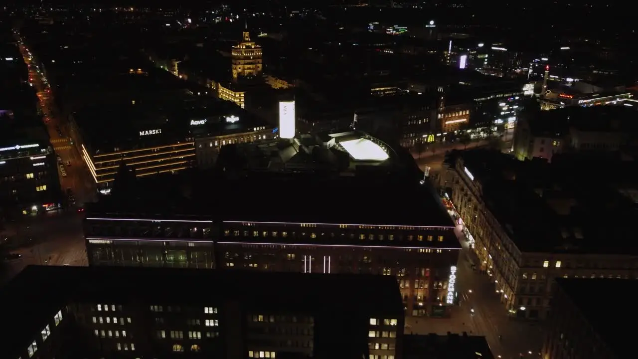 Helsinki night flight over triangular department store Stockmans