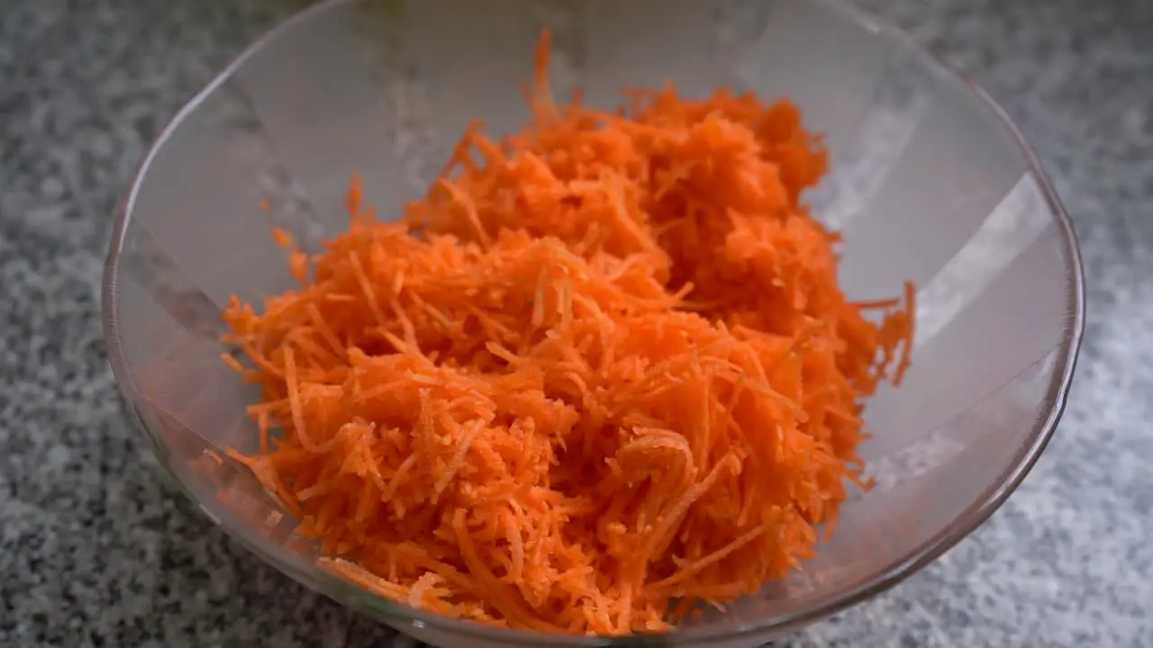 Bowl Of Grated Carrots Ingredient For Carrot Cake