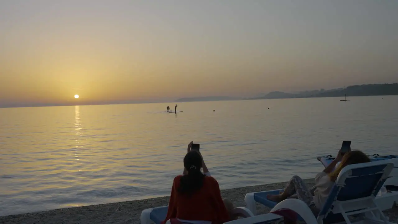 Beautiful shot Girls sunset and rowing