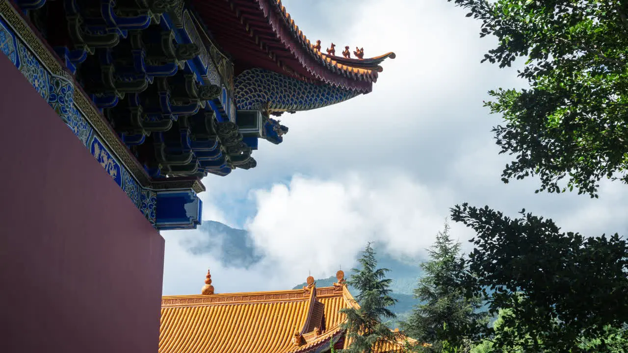 Time lapse of cloud formation over traditional oriental Chinese building rooftop