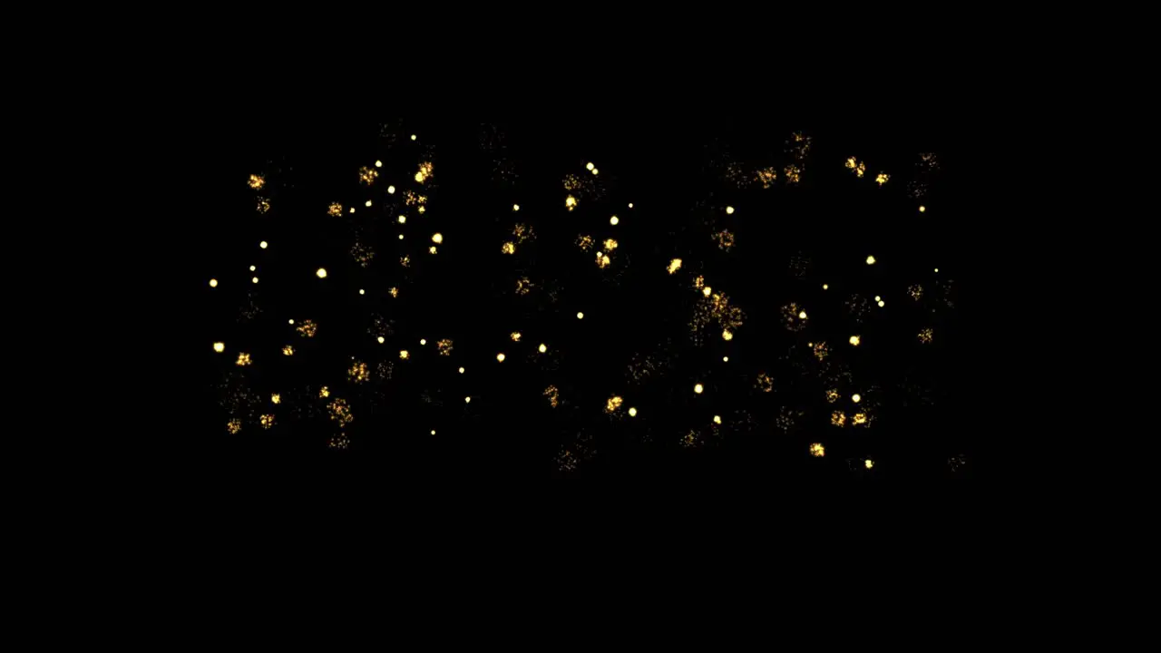 Visual effects VFX small yellow glowing sparks bursting on black background 2D animation