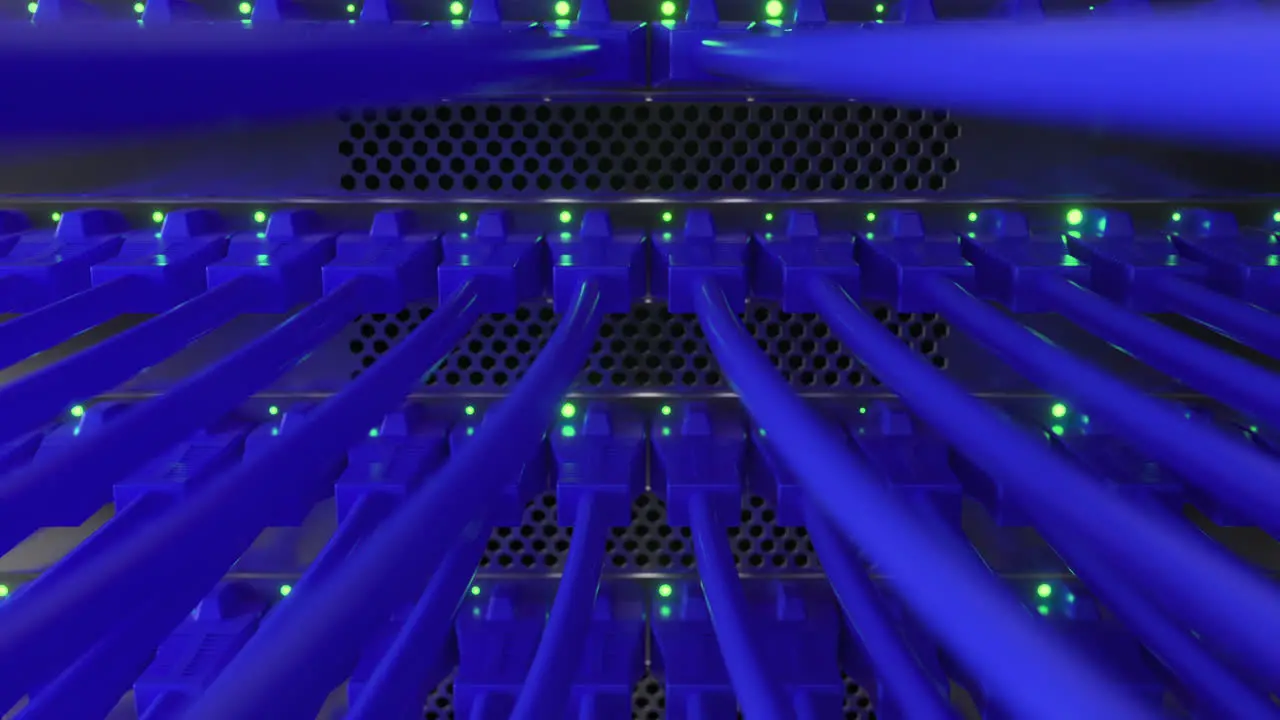 Close up view of internet network switch with connected blue ethernet cables