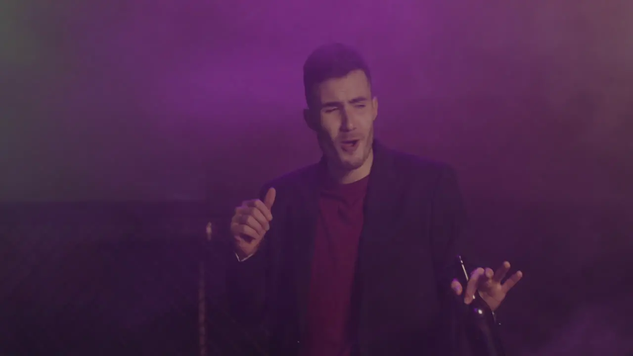 Young Man Drinking Beer And Dancing At Disco 2