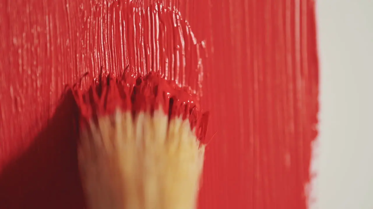 Detail Of A Brush Painting In Red A Canvas