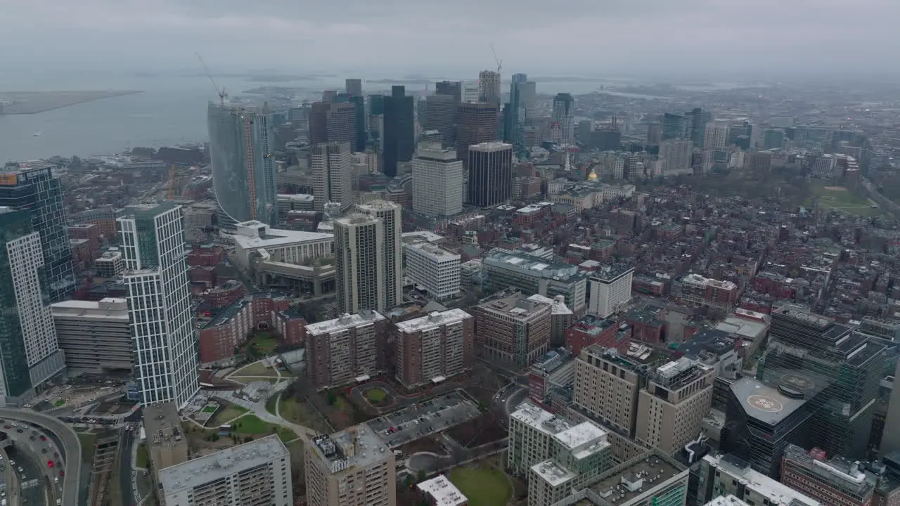 Aerial panoramic footage of Hospital complex and modern high rise downtown office buildings Boston USA