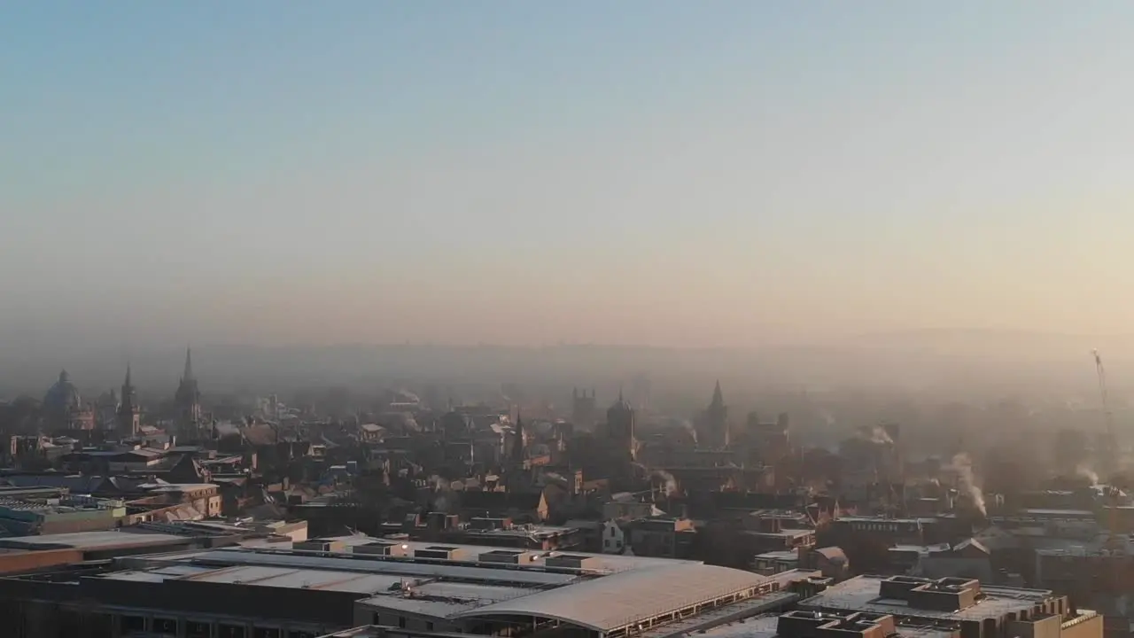 Rising drone shot of Oxford City on a cold frosty morning