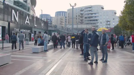 Exterior Of The Emirates Stadium Home Ground Arsenal Football Club London With Supporters On Match Day 17