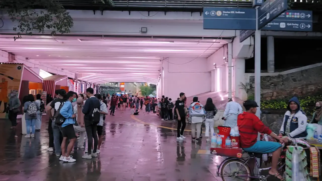 Tracking Shot of Groups of People Walking in Jakarta