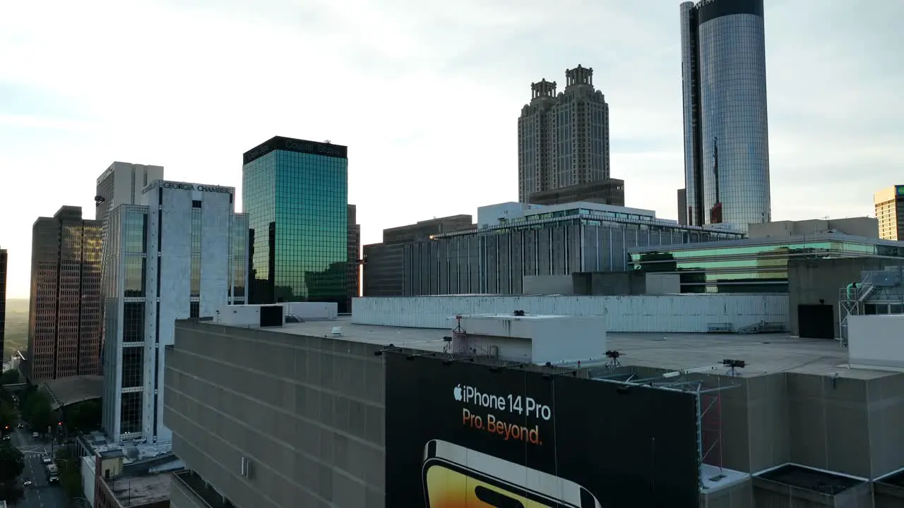 Apple iPhone 14 Pro and ATT billboard advertisement on urban city building