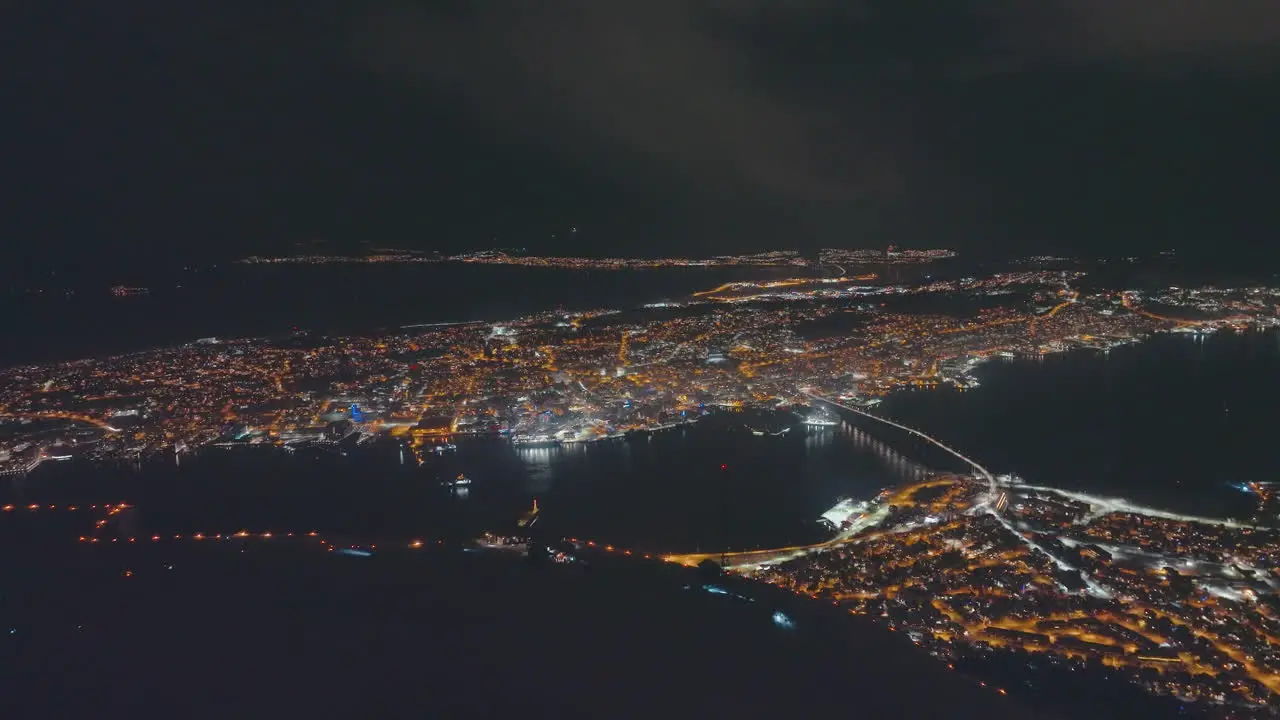 Aerial view of Tromso city in Norway at night from Fjellheisen viewpoint