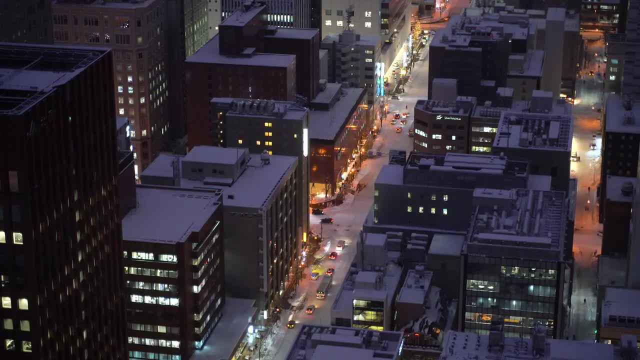 Close up shot of urban city with snowed in roads at night