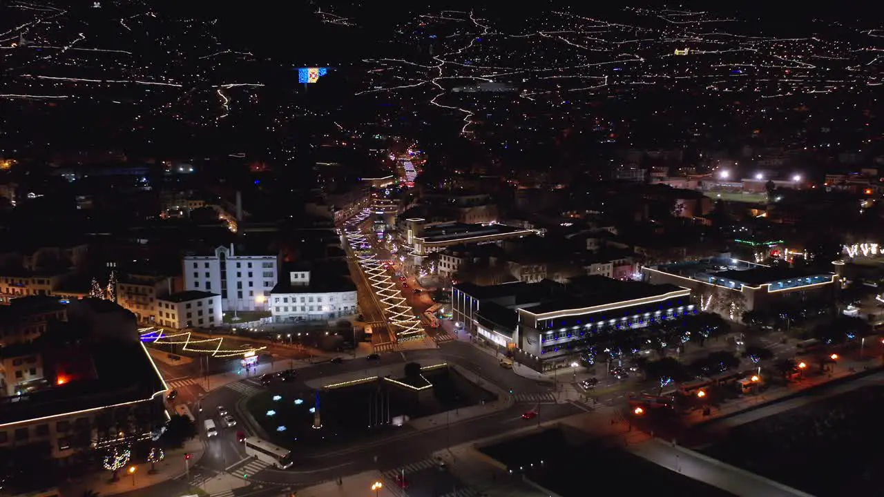 Funchal city on Madeira Island at night with view of boulevard aerial