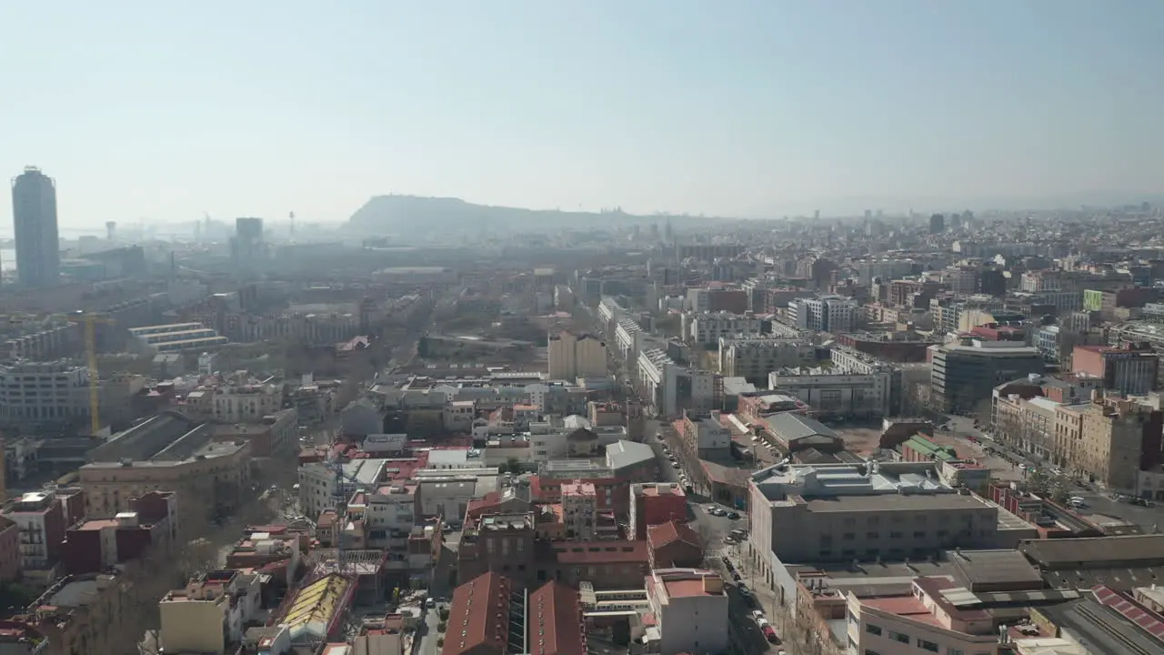 Various buildings in metropolis Aerial view of development in large city on sunny day Barcelona Spain