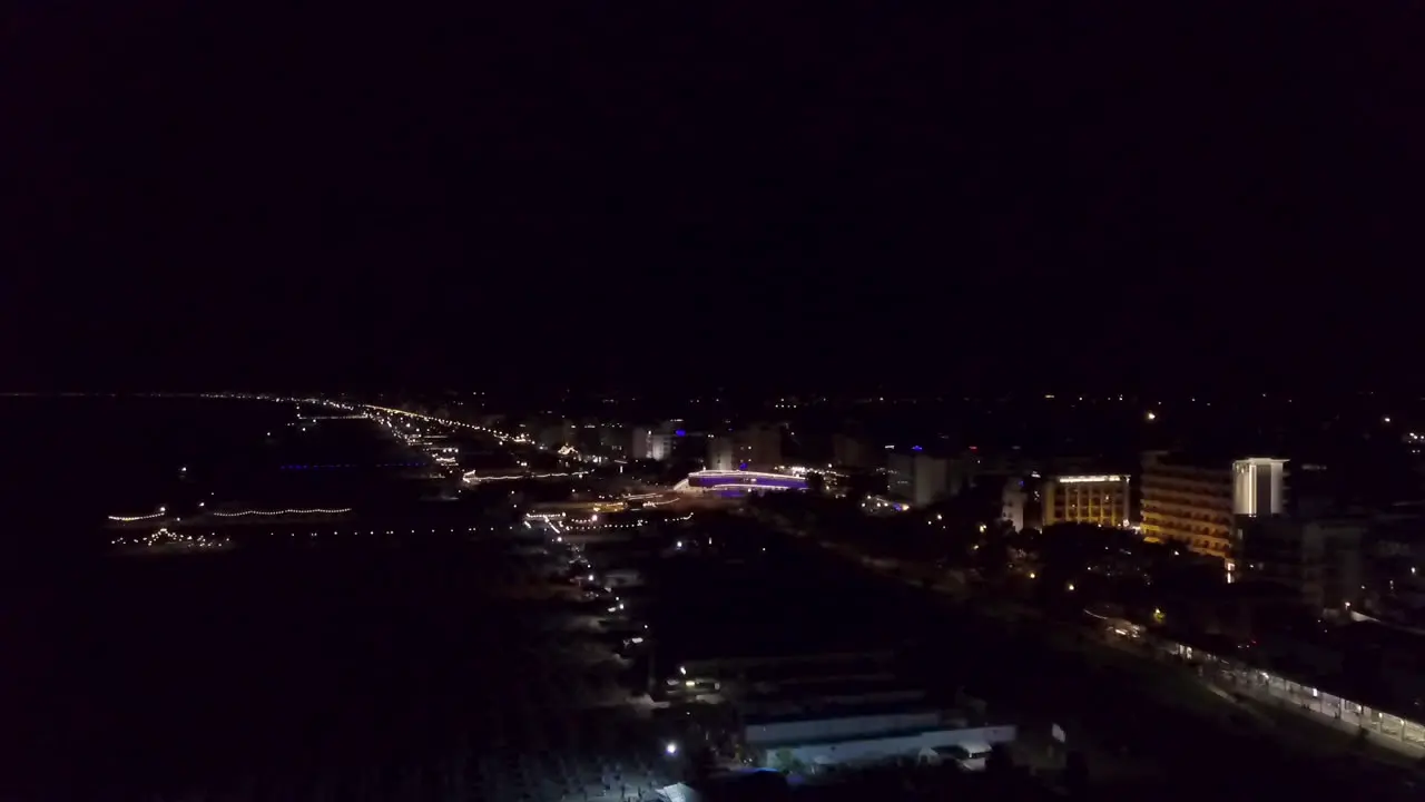 Picturesque View Of Rimini Beach In Italy Illuminated At Night