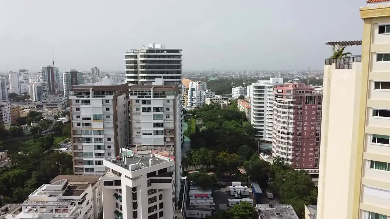 drone tilted upward of santo domingo city with view of the santo domingo