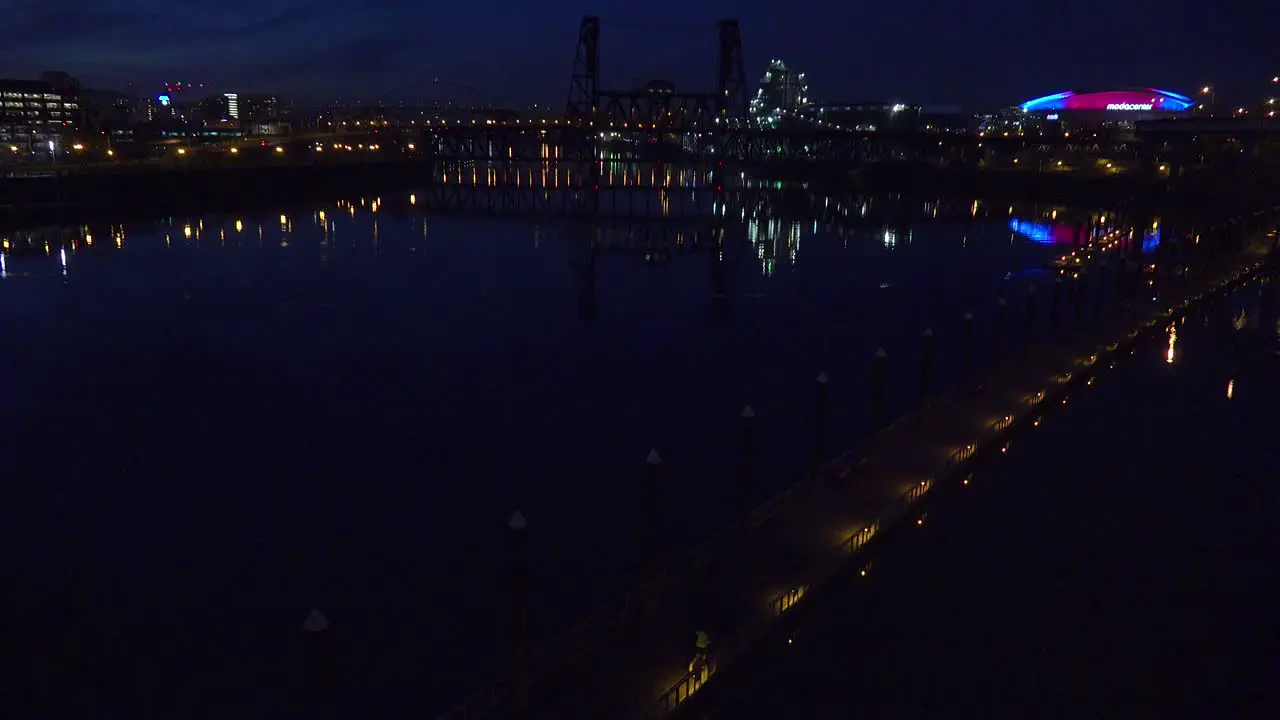 Wide establishing shot of the Moda Center in Portland Oregon at night