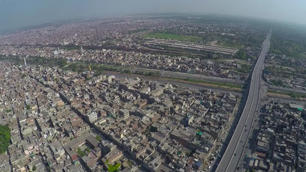 Aerial view over the City traffic road junction and canal bridge highway