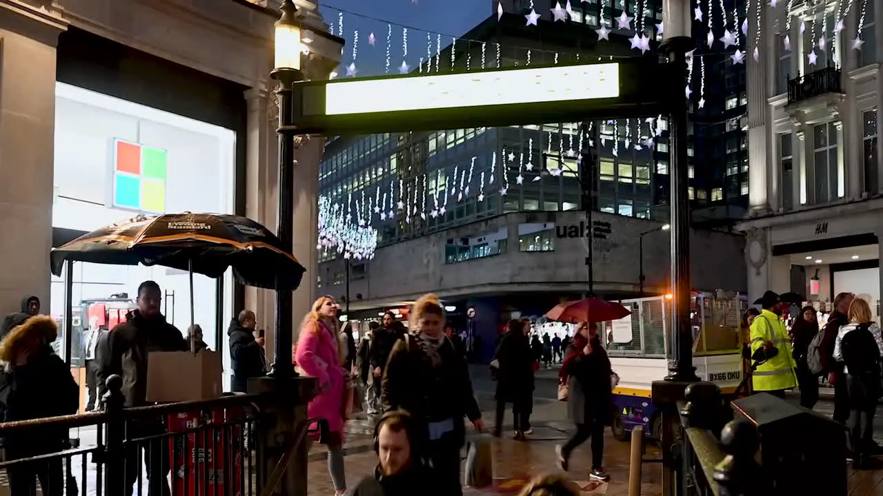 Rainy day down to the Oxford Street Underground next to the Microsoft Store London United Kingdom