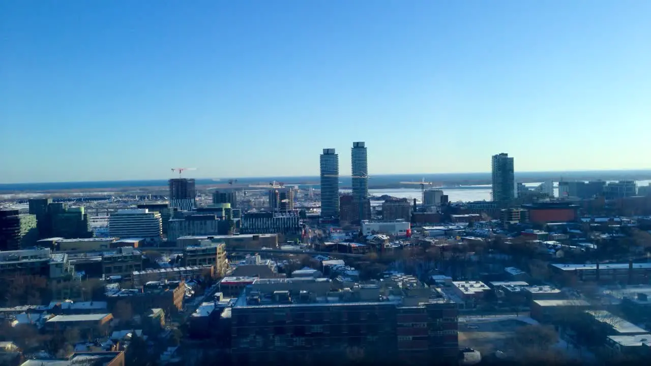 Time lapse from Toronto Regent Park area buildings view from North looking West onto Quayside and Bayside Toronto Canada area district aerial view towards Lake Ontario fast motion establishing shot