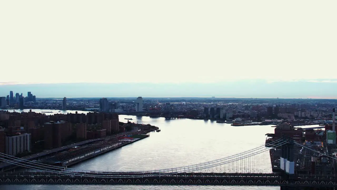 Aerial view in front of he Manhattan bridge and the East river dawn in NYC USA