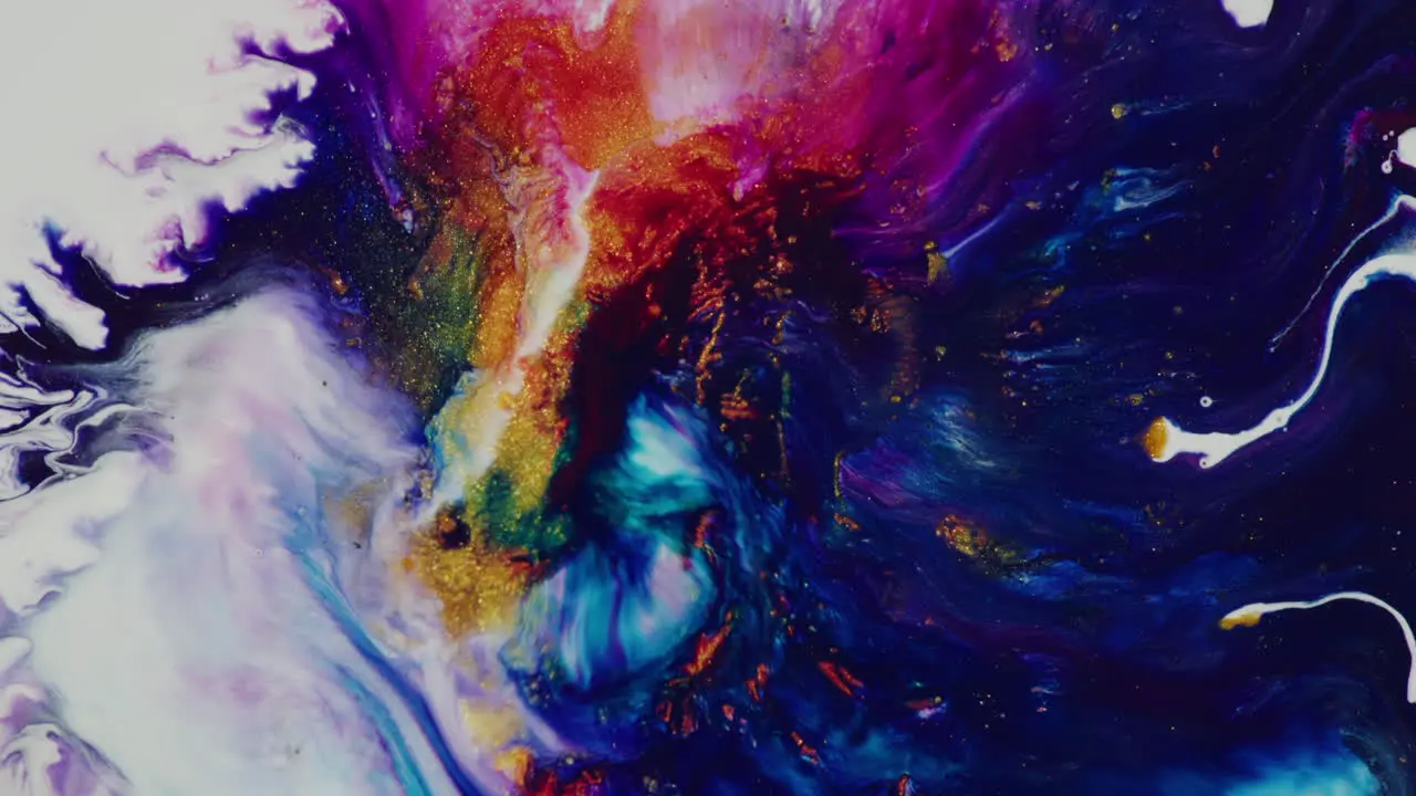 Abstract spray of colorful liquid in the center