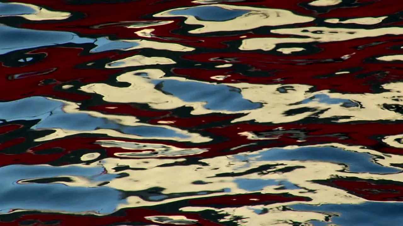 Red and blue patterns form an unusual liquid surface