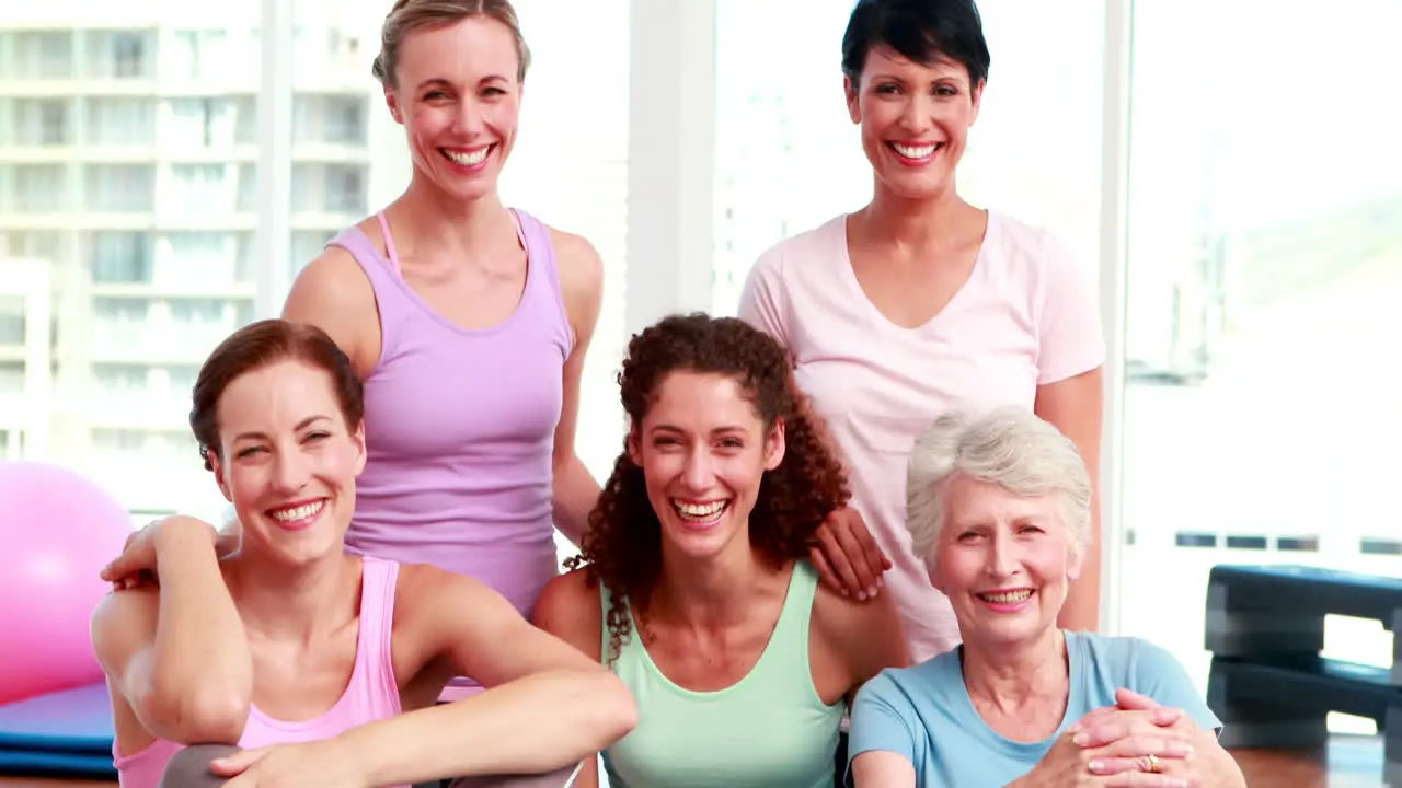 Smiling group of women in fitness studio