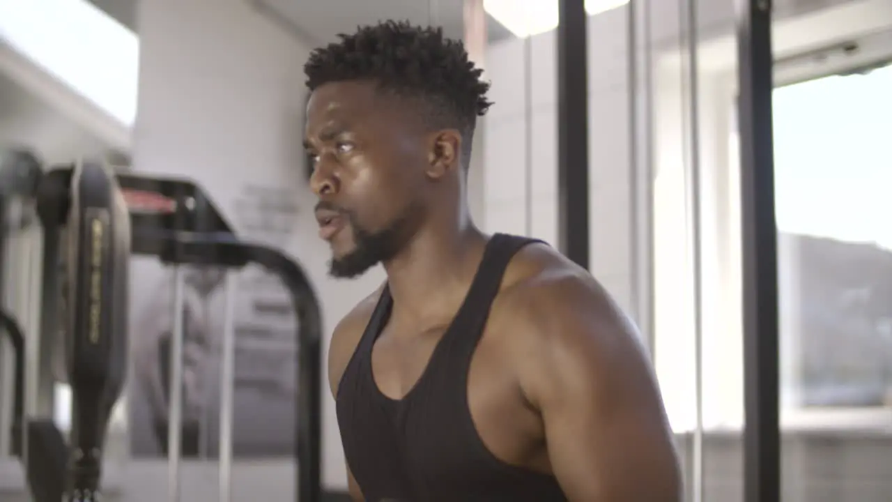 Man Working Out in Gym