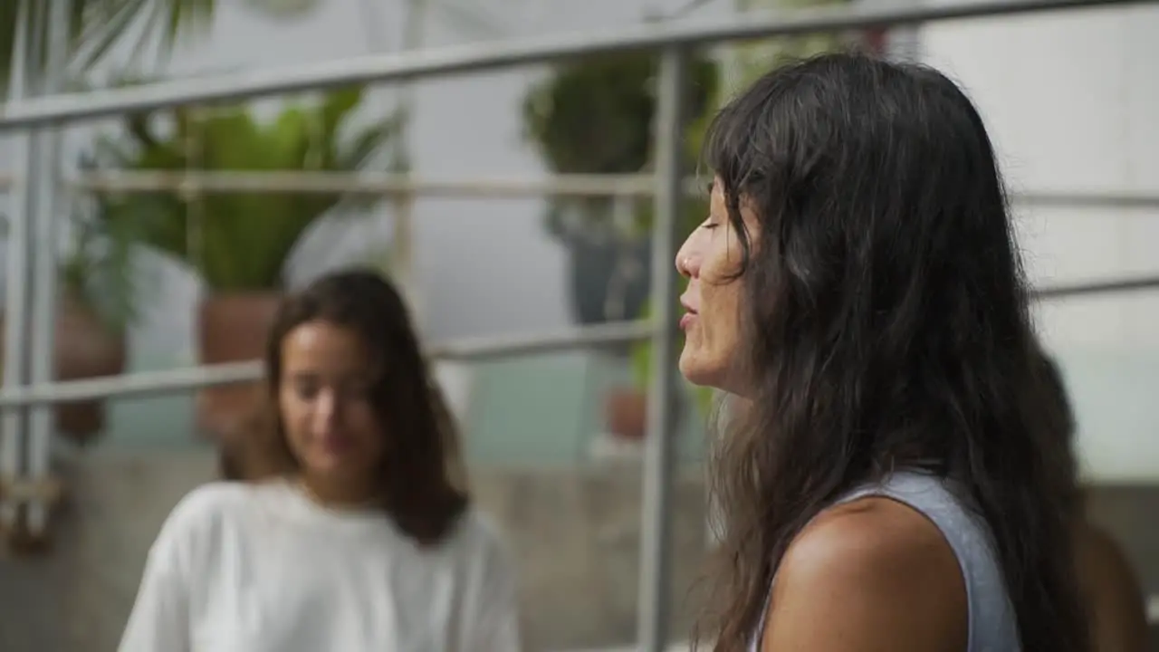 Yoga Coach Closing Her Eyes Meditating In Nature With Her Students Lima Peru