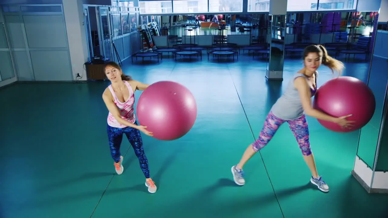 Young women do yoga in the gym 2