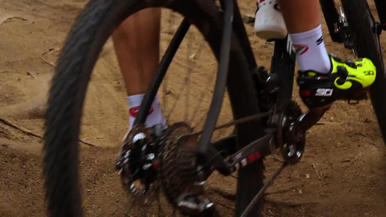 Close Up Bike Passing on Dirt Track