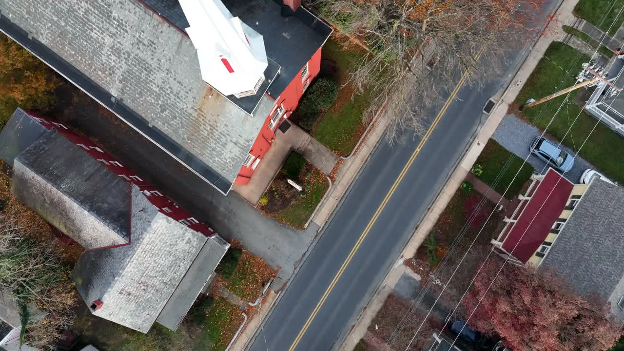 Top down aerial of church steeple in American village