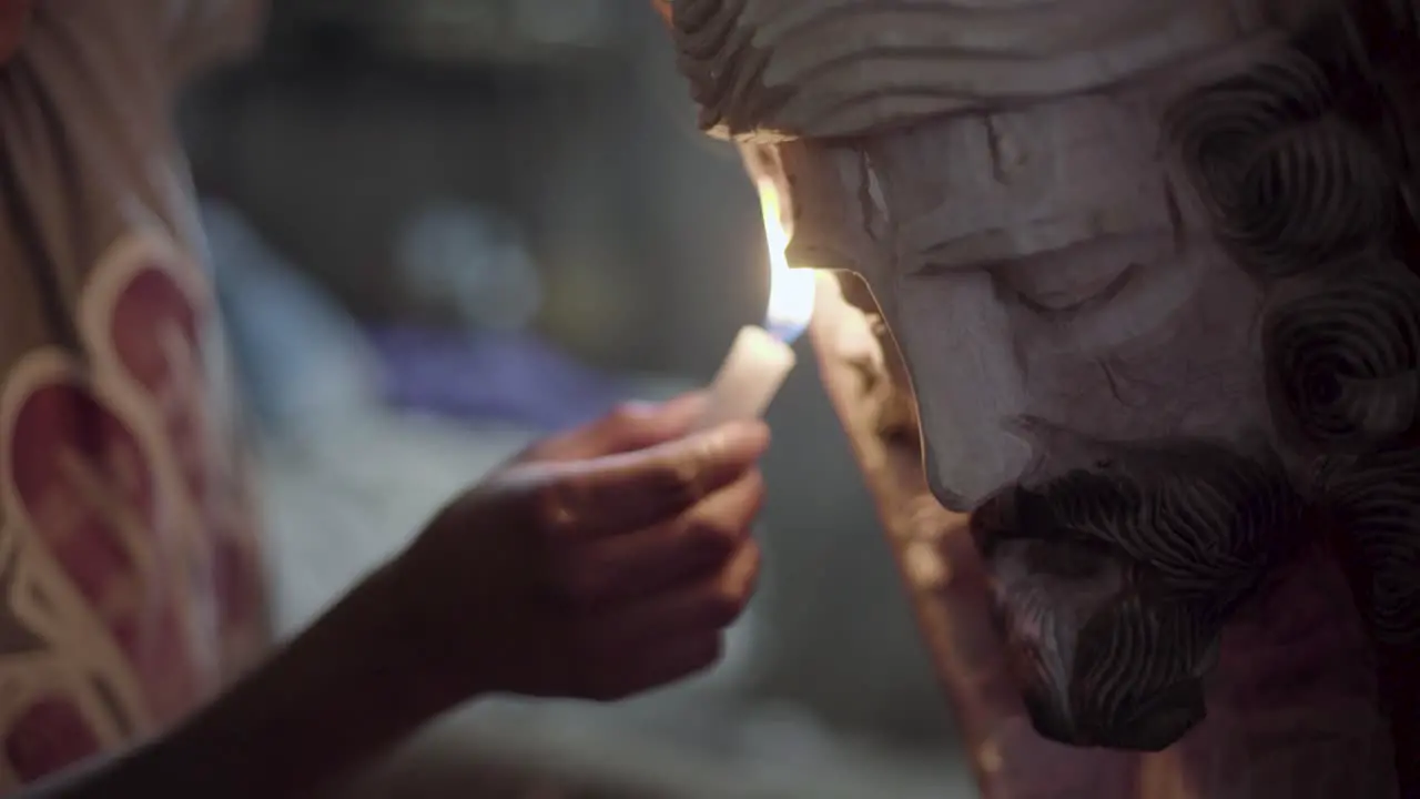 Woodcarvers in Antigua Guatemala carve souvenir wooden effigies of Jesus Christ during easter week Semana Santa 7