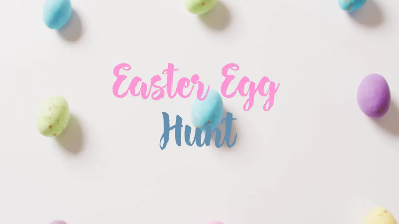 Animation of easter egg hunt text over colourful easter eggs on white background