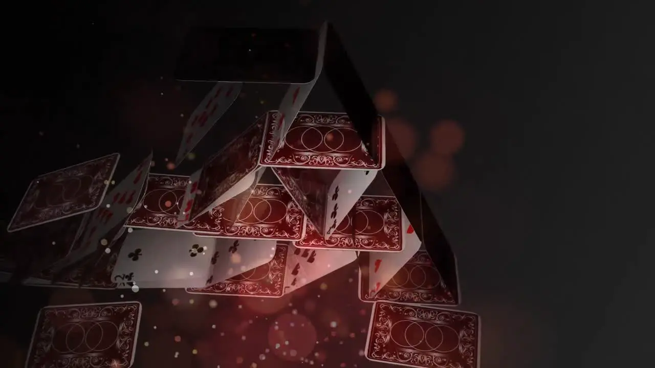 Card pyramid collapsing on a dark background with lights animation