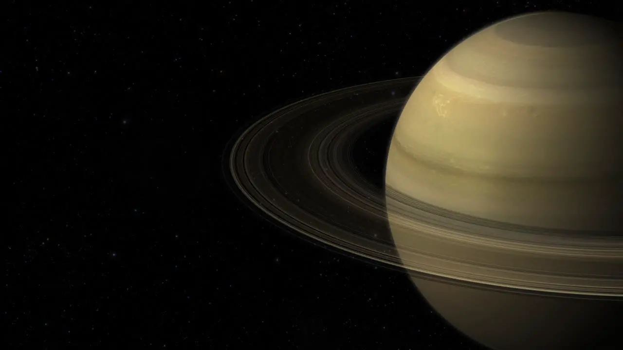 CGI composite planet Saturn with rings rotating screen-right