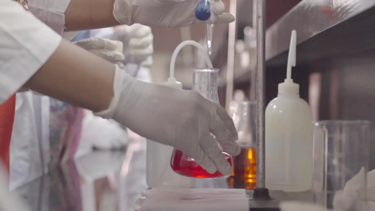 Hand of a girl in research laboratory