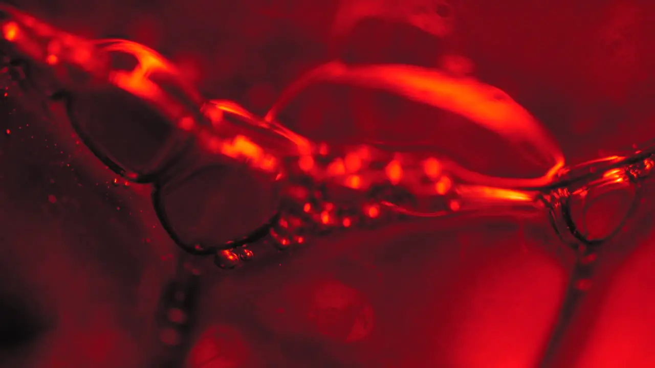 Red Bubbles in Abstract Macro Background Slow Motion