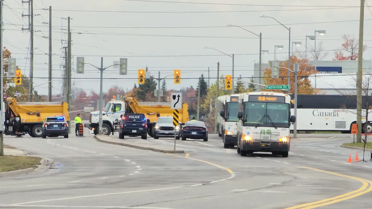 View of blocked traffic due to police funeral buses for special transport people cross the road