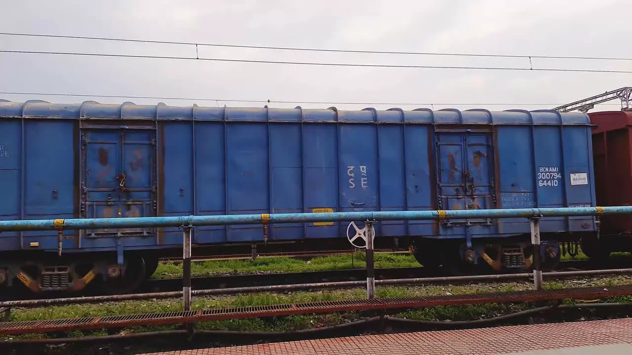 isolated rail goods carrier running on track at evening from flat angle video is taken at kamakhya railway station assam india on May 22 2022