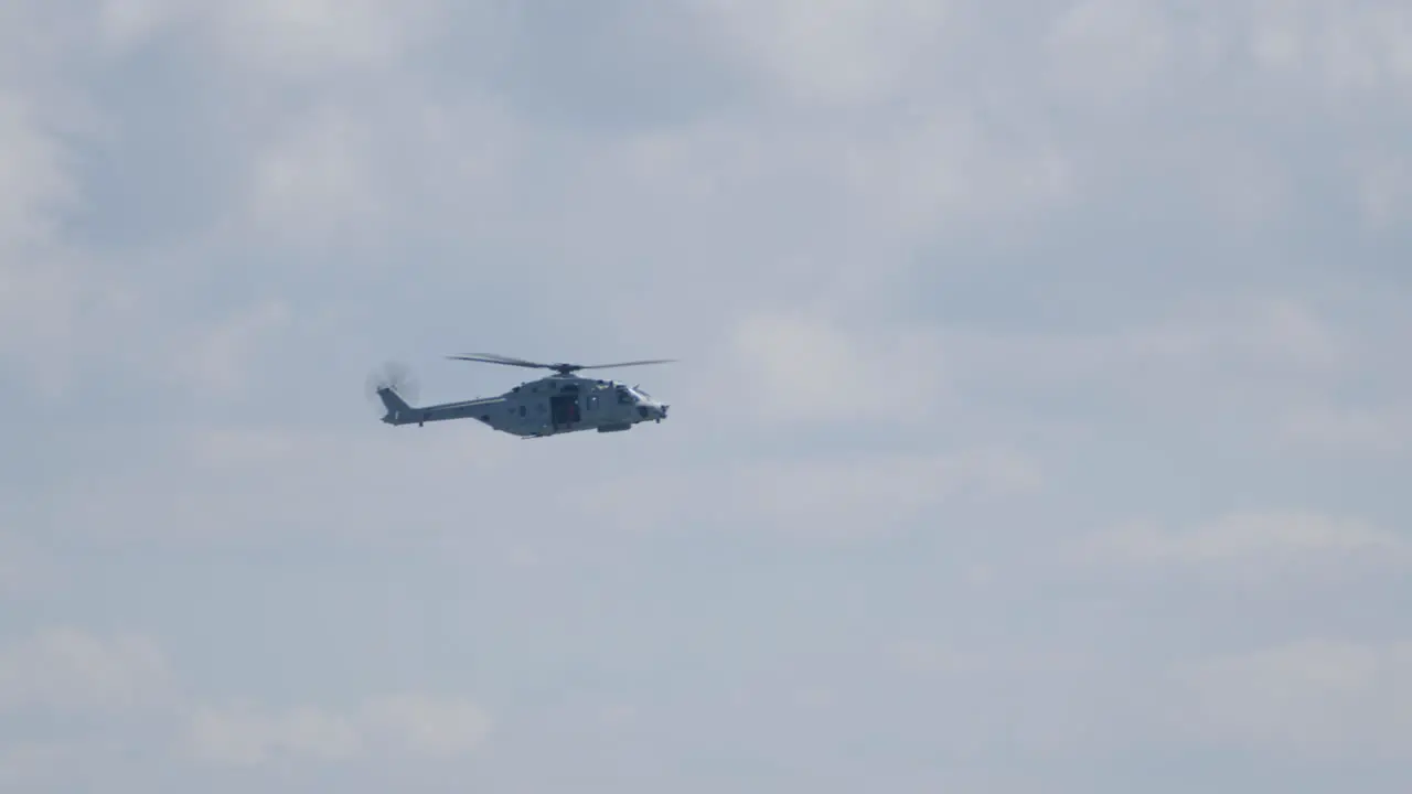 Military Transport Helicopter Flying into a Right Turn SLOMO